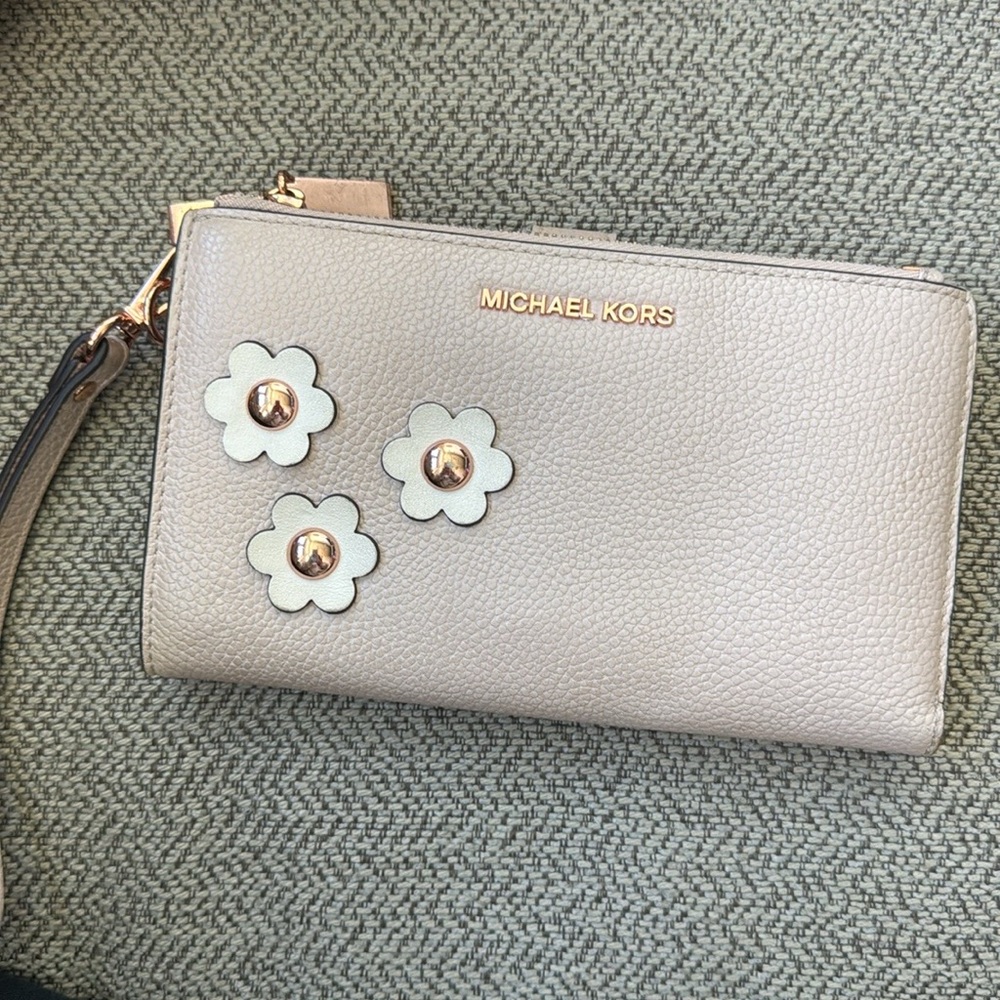 Used Michael Kors floral double zip wallet
